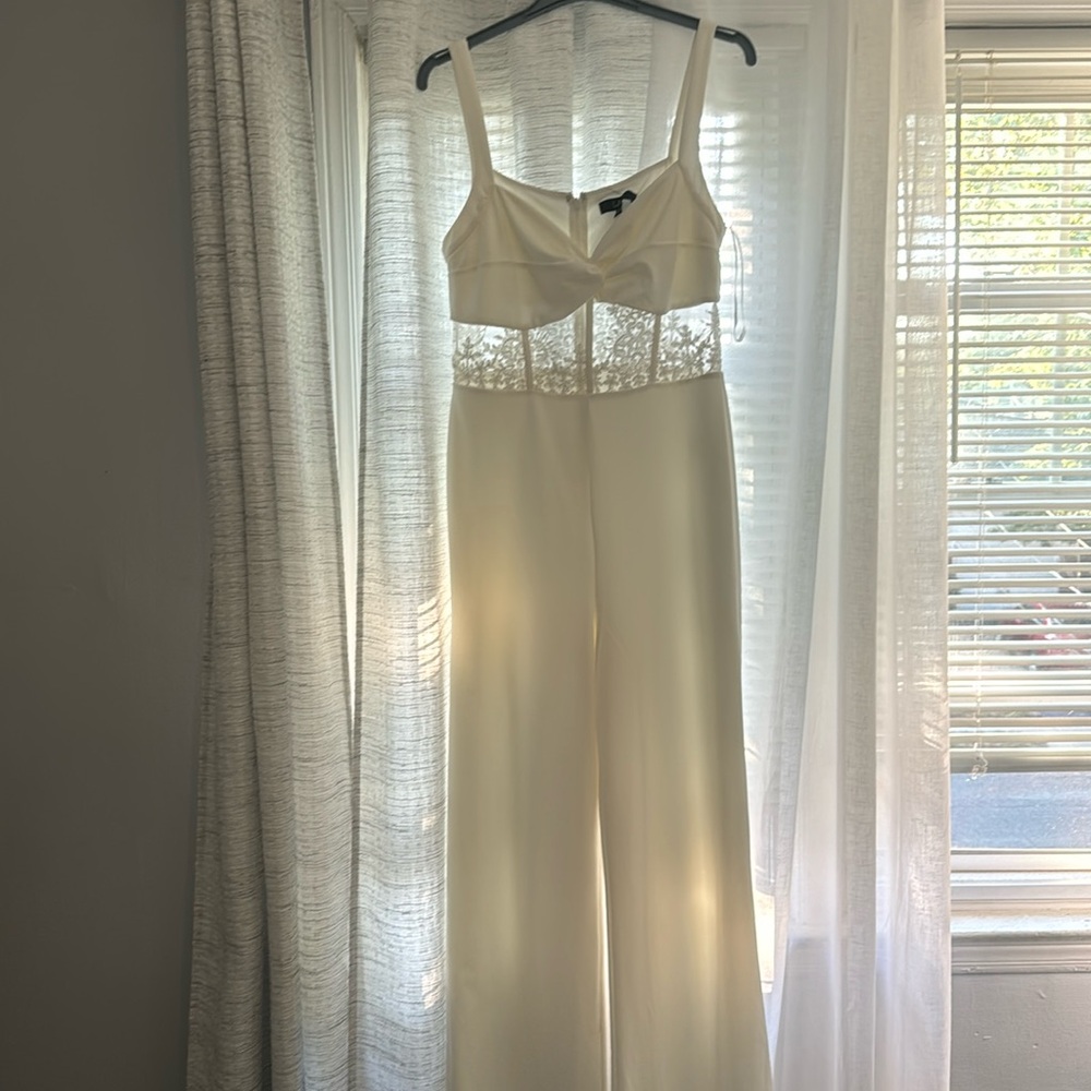Lulus white jumpsuit with lace/corset detail